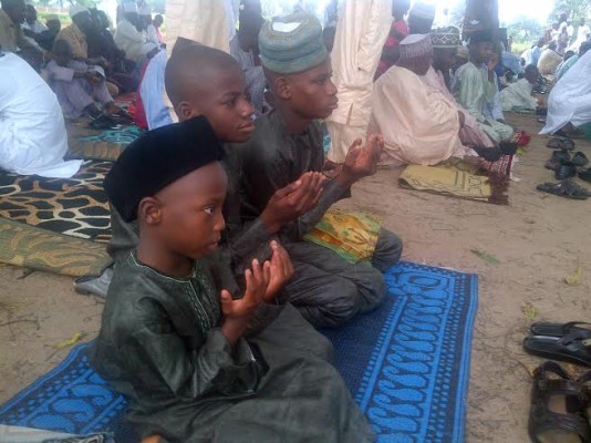 Children at Eid groud in Kuje praying for Nigeria