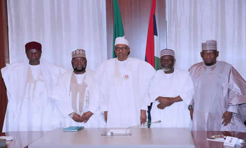 President Muhammadu Buhari and some Visiting Ulamas pose for a group picture