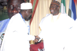 Ozi in handshake with President Jonathan