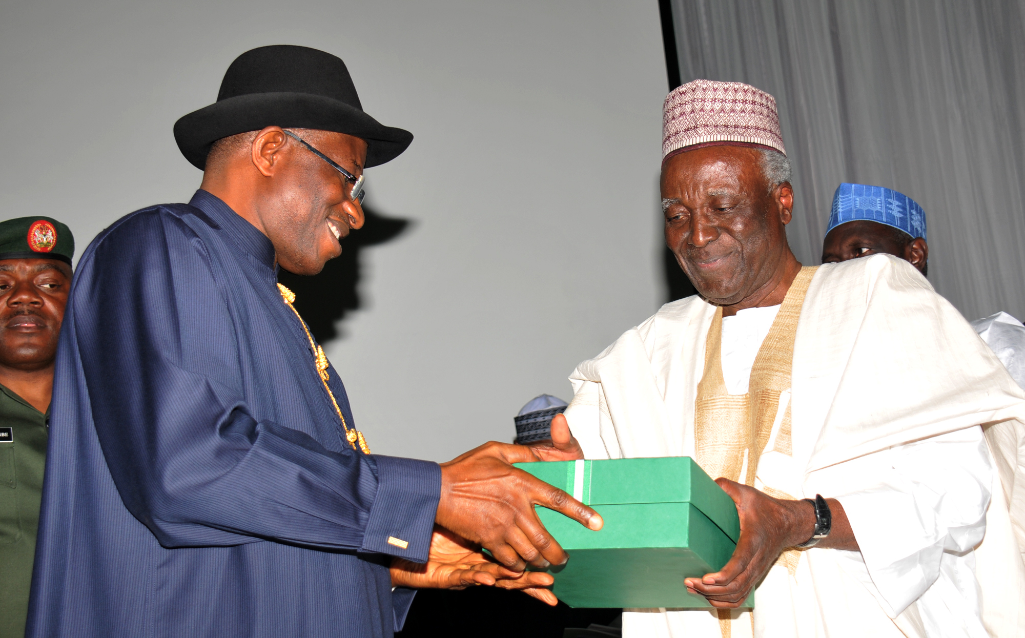 Justice Idris Kutigi Presenting Confab Report To President Goodluck Jonathan
