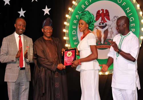 From Left: Minister Of Sports, Dr Tamuno Danagogo; President Goodluck Jonathan; Commonwealth Games Gold Medalist, Blessing Okagbare  And Directorgeneral National Sports Commission, Mr Gbenga Elegbeleye At A Presidential Reception For Victorious Athlets And Officials At International Competitions In 2014 In Abuja On Wednesday Night (8/10/14)