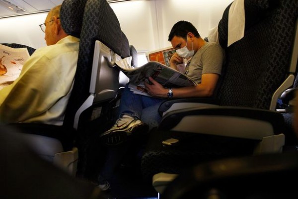 American plane with sick passengers