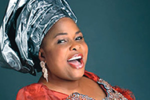 Dame Patience laughs