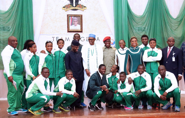 PRESIDENT BUHARI UNVEIL TEAM NIGERIA. 4A. ;  President Muhammadu Buhari (M) flanked by ice President Prof Yemi Osinbajo, Minister of Youth and Sports, Barrister Solomon Dalung and Team Nigeria for the 2016 Rio Olympic as President receives investiture as the Grand Patron of the Nigerian Olympic Committee at the State House in Abuja. PHOTO;SUNDAY AGHAEZE. JULY 19 2016.