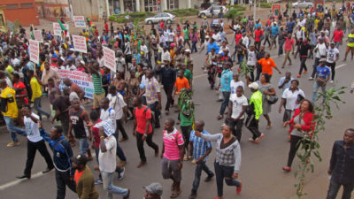 People take part in a march to show their support for the Cameroon army fighting against Boko Haram militants in the city of Yaounde, Cameroon, Saturday, Feb. 7, 2015. Boko Haram staged an overnight assault on a border town in Niger, residents said Sunday, the second time the West African nation has come under attack by the Nigeria-based extremists since Friday. (AP Photo/Joel Kouam)
