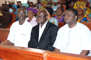 O.J ABUAH BURIAL 3. R-L; Special Adviser to the President on Media and Publicity, Mr Femi Adesina, Immediate Past Special Adviser to President Jonathan, Former Special Adviser to the Late President Alhaji Musa Shehu Yar'Adua, Mr Segun Adeniyi during the funeral service for the late Director of Information State House, Mr Justin Abuah at our Lady Queen of Nigeria in Abuja. PHOTO; SUNDAY AGHAEZE. SEPT 16 2016