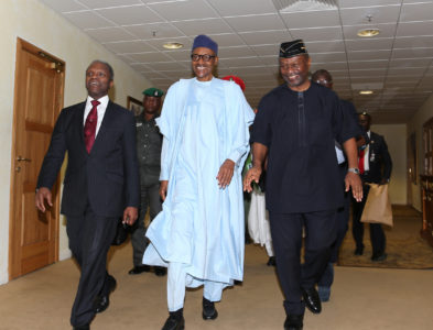 PRESIDENT BUHARI OPENS 2016 CABINET RETREAT. 1A&B. President Muhammadu Buhari (M) Flanked by the Vice President Prof Yemi Osinbajo left and Minister of Budget and National Planning, Senator Udoma Udo Udoma as President opens 2016 Ministerial Retreat on the Economy for 2017 budget at the Conference centre of the Presidential Villa in Abuja. PHOT; SUNDAY AGHAEZE. SEPT 15 2016