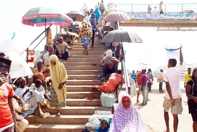 FCT Minister Bans Hawkers, Beggars On Pedestrian Bridges