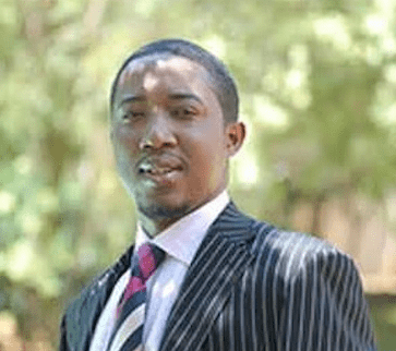 Owner Of The Controversial MMM Nigeria, Unmasked: He Is ‘Pastor’ Mbanefo
