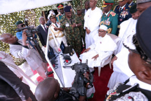 PRESIDENT BUHARI ATTENDS 2017 ARMED FORCES DAY 6B. President Muhammadu Buhari speaks with Military men in Operation base via NigComSat. With are Vice President Yemi Osinbajo, Minister of Defence, Bgrig General Mansur Dan Ali, President of the Senate, Dr Bukola Saraki and other Service Chiefs during the Wreath Laying ceremony of 2017 Armed Forces Remembrance Day at the Arcade in Abuja. PHOTO; SUNDAY AGHAEZE. JAN 2017