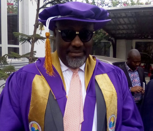 Dino Melaye Acts ‘Clown,’ Wears Academic Gown To Senate Session