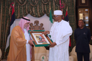 PRESIDENT BUHARI RECEIVES OUTGOING SAUDI ARABIA AMB. 2 PRESIDENT MUHAMMADU BUHARI PRESENTING A GIFT TO THE OUT GOING AMBASSADOR OF SAUDI ARABIA TO NIGERIA, H.E. FAHAD BIN ABDULLAHI SEFYEN DURING A FAREWELL VISIT TO STATE HOUSE, ABUJA, STATE HOUSE PHOTO/SUNDAY AGHAEZE, MAR 30 2017