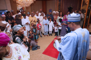 PRESIDENT BUHARI SURPRISE BIRTHDAY@75 000. President Muhammadu Buhari gathered by Vice President Yemi Osinbajo, some Governors and Children and Grand Children during a surprise 75TH birthday get-together at the Residence Presidential Villa Abuja. PHOTO; SUNDAY AGHAEZE. DEC 17 2017