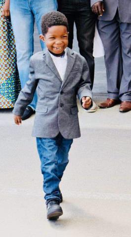 Boko Haram Kid Victim Miraculously Walks Out Of Danger After Surgery In Dubai, Gets Scholarship