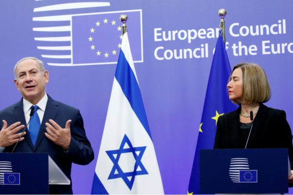 Israel's Prime Minister Benjamin Netanyahu and European Union foreign policy chief Federica Mogherini brief the media at the European Council in Brussels, Belgium December 11, 2017
