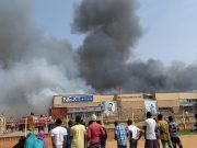 Minister Commends Abuja Residents For Salvaging Goods From Burning Next Supermarket