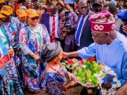 Flower From Little ‘Damsel’ For Asiwaju Tinubu In Osun
