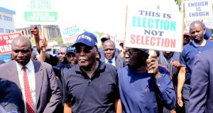 Atiku, Ayu, Others Occupy INEC Headquarters, Want Tinubu Sacked As President-elect