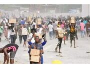 Hungry Nigerians Break Into Government Store In Abuja, Cart Away Foods